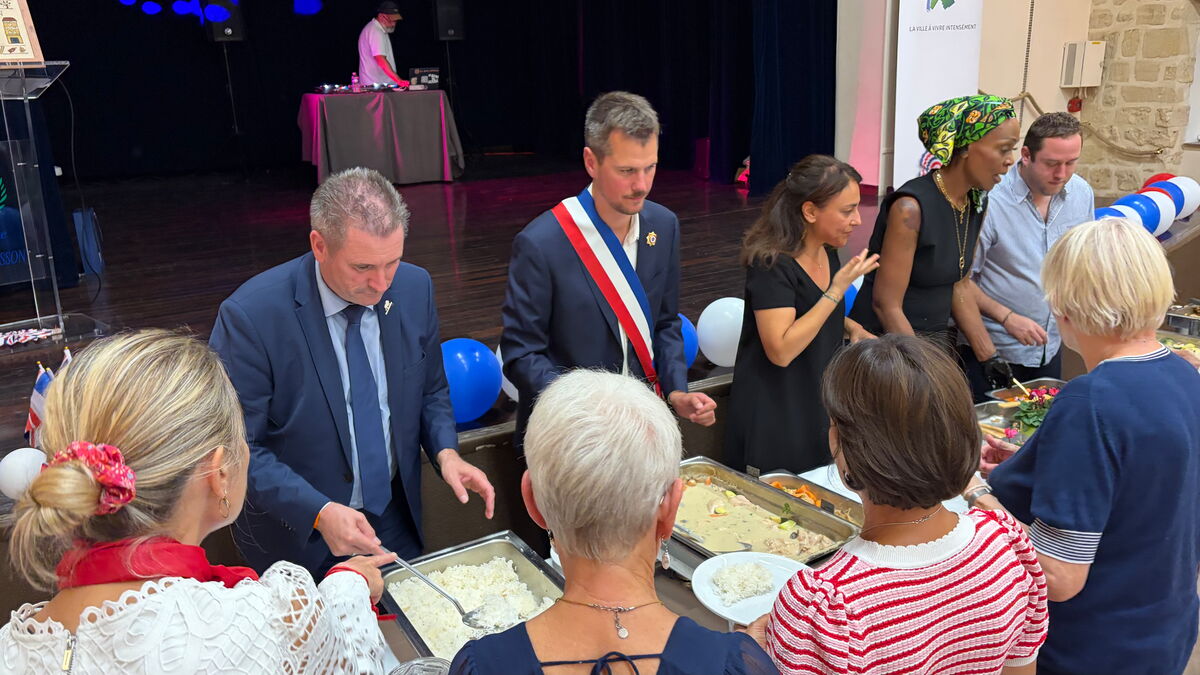 Essensausgabe anlässlich des Parnterschaftsessens in Montesson
